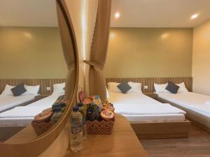 Phòng Hai Giường Đơn Loại Sang (Deluxe Twin Room)