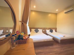 Phòng Hai Giường Đơn Loại Sang (Deluxe Twin Room)