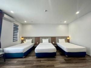 Phòng Deluxe 3 Người Nhìn Ra Biển (Deluxe Triple Room with Sea View)