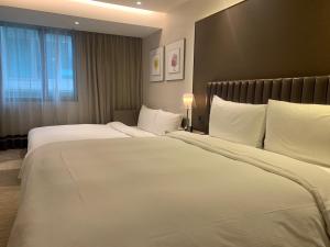 Phòng Thương gia 4 giường (Business Quadruple Room)