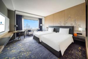 Phòng Executive 2 Giường đơn với Quyền lui tới Lounge (Executive Twin Room with Lounge Access)