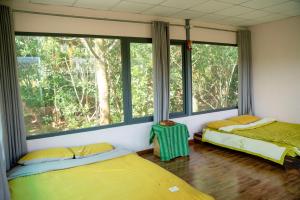 Phòng Deluxe Giường Đôi/2 Giường Đơn Nhìn Ra Vườn (Deluxe Double or Twin Room with Garden View)