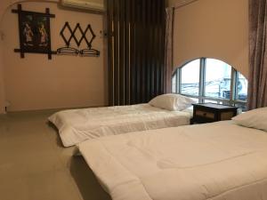 Phòng Hạng Tiết kiệm 2 Giường Đơn - Không có Cửa sổ (Budget Twin Room - No Window)