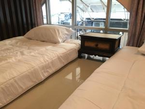 Phòng Hạng Tiết kiệm 2 Giường Đơn - Không có Cửa sổ (Budget Twin Room - No Window)