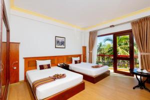 Phòng Deluxe Có 2 Giường Cỡ Queen (Deluxe Queen Room with Two Queen Beds)