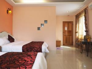 Phòng Deluxe 4 Người (Deluxe Quadruple Room)