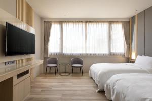 Phòng Giường Đôi/2 Giường Đơn Có Phòng Tắm Riêng (Double or Twin Room with Private Bathroom)