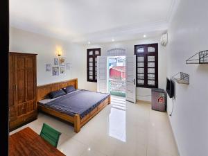 Phòng Deluxe Giường Đôi Có Ban Công (Deluxe Double Room with Balcony)