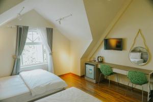 Phòng 4 Người Có Ban Công (Quadruple Room with Balcony)