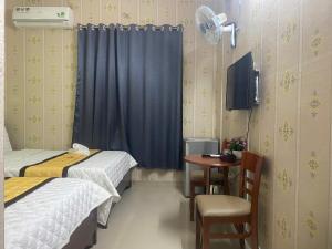 Phòng Hạng Tiết kiệm Cho 4 Người (Economy Quadruple Room)