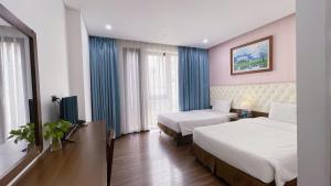 Phòng Deluxe Giường Đôi/2 Giường Đơn Nhìn Ra Thành Phố (Deluxe Double or Twin Room with City View)