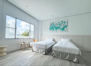 Phòng Hai Giường Đơn Loại Sang (Deluxe Twin Room)