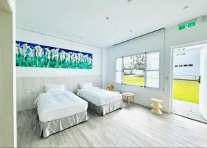 Phòng Hai Giường Đơn Loại Sang (Deluxe Twin Room)