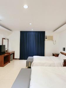 Phòng gia đình với phòng tắm riêng. (Family Room with Private Bathroom)