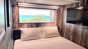 Giường trong Phòng ngủ tập thể 4 người (Bed in 4-Bed Dormitory Room)