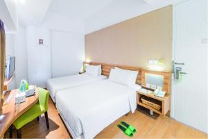 Phòng Hai Giường Đơn Loại Sang (Deluxe Twin Room)