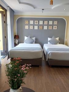 Phòng Hai Giường Đơn Loại Sang (Deluxe Twin Room)