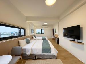 Phòng Deluxe Có 2 Giường Cỡ Queen (Deluxe Queen Room with Two Queen Beds)