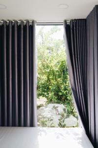 Phòng Có Giường Cỡ King Nhìn Ra Vườn (King Room with Garden View)
