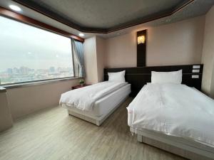 Phòng Deluxe Giường Đôi/2 Giường Đơn Nhìn Ra Sông (Deluxe Double or Twin Room with River View)