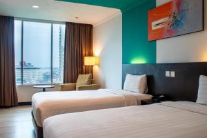 Phòng Hai Giường Đơn Loại Sang Hướng Thành Phố (Deluxe City View Twin Room)