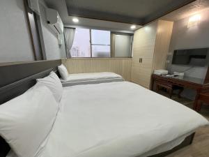 Phòng Hướng Sông Cho Ba Người – Cấm Hút Thuốc (River View Triple Room - Non-Smoking)