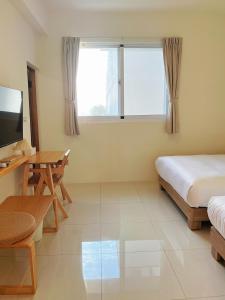Phòng Bốn Người Có Phòng Tắm Riêng (Quadruple Room with Private Bathroom)