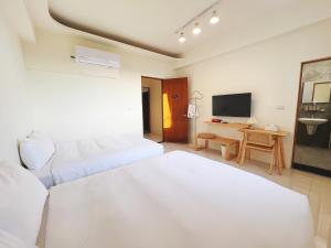 Phòng Bốn Người Có Phòng Tắm Riêng (Quadruple Room with Private Bathroom)