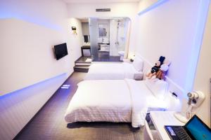 Phòng Hai Giường Đơn Loại Sang (Deluxe Twin Room)