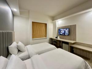 Phòng Hai Giường Đơn Loại Sang (Deluxe Twin Room)