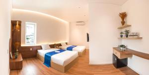 Phòng Deluxe Giường Đôi/2 Giường Đơn (Deluxe Double or Twin Room)