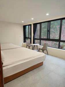 Phòng Deluxe 4 Người (Deluxe Quadruple Room)