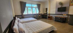 Phòng 4 Người Có Phòng Tắm (Quadruple Room with Bathroom)