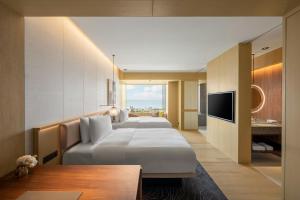 Phòng Deluxe 2 Giường Đơn Nhìn Ra Biển (Deluxe Twin Room with Ocean View )