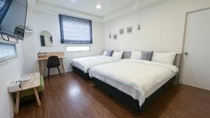 Phòng Tiêu Chuẩn 4 Người (Standard Quadruple Room)