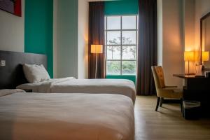 Phòng Hai Giường Đơn Loại Sang (Deluxe Twin Room)
