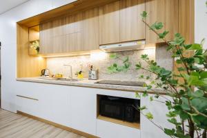 Căn Hộ - Tầng Trệt (Apartment - Ground Floor)
