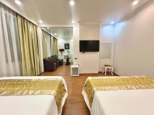 Phòng Deluxe Có 2 Giường Cỡ Queen (Deluxe Queen Room with Two Queen Beds)
