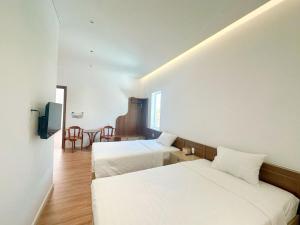 Phòng Deluxe Giường Đôi/2 Giường Đơn (Deluxe Double or Twin Room)