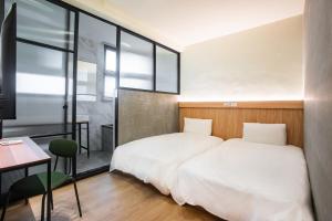 Phòng Hai Giường Đơn Loại Sang (Deluxe Twin Room)