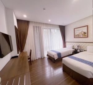 Phòng Deluxe Giường Đôi/2 Giường Đơn Nhìn Ra Thành Phố (Deluxe Double or Twin Room with City View)