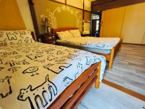Phòng 3 người với Phòng tắm Chung (Triple Room with Shared Bathroom)
