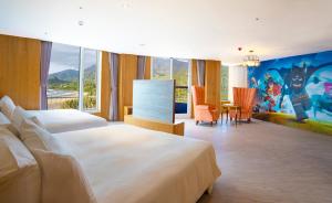 Phòng Gia đình có Ban công và Nhìn ra Biển (Family Room with Balcony and Sea View)