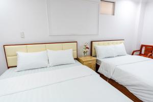 Phòng Bốn Người Có Phòng Tắm Riêng (Quadruple Room with Private Bathroom)