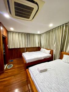 Phòng Đôi Tiêu Chuẩn Có 2 Giường Đôi (Standard Double Room with Two Double Beds)