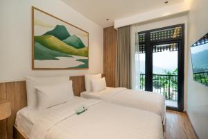 Phòng Hai Giường Đơn Loại Sang (Deluxe Twin Room)