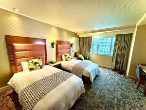 Phòng Hai Giường Đơn Loại Sang (Deluxe Twin Room)