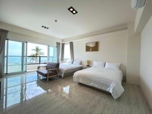Phòng Deluxe 4 Người Nhìn Ra Biển (Deluxe Quadruple Room with Sea View)