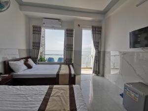 Phòng 4 Người Nhìn Ra Biển (Quadruple Room with Sea View)