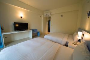 Phòng Deluxe 4 Người (Deluxe Quadruple Room)